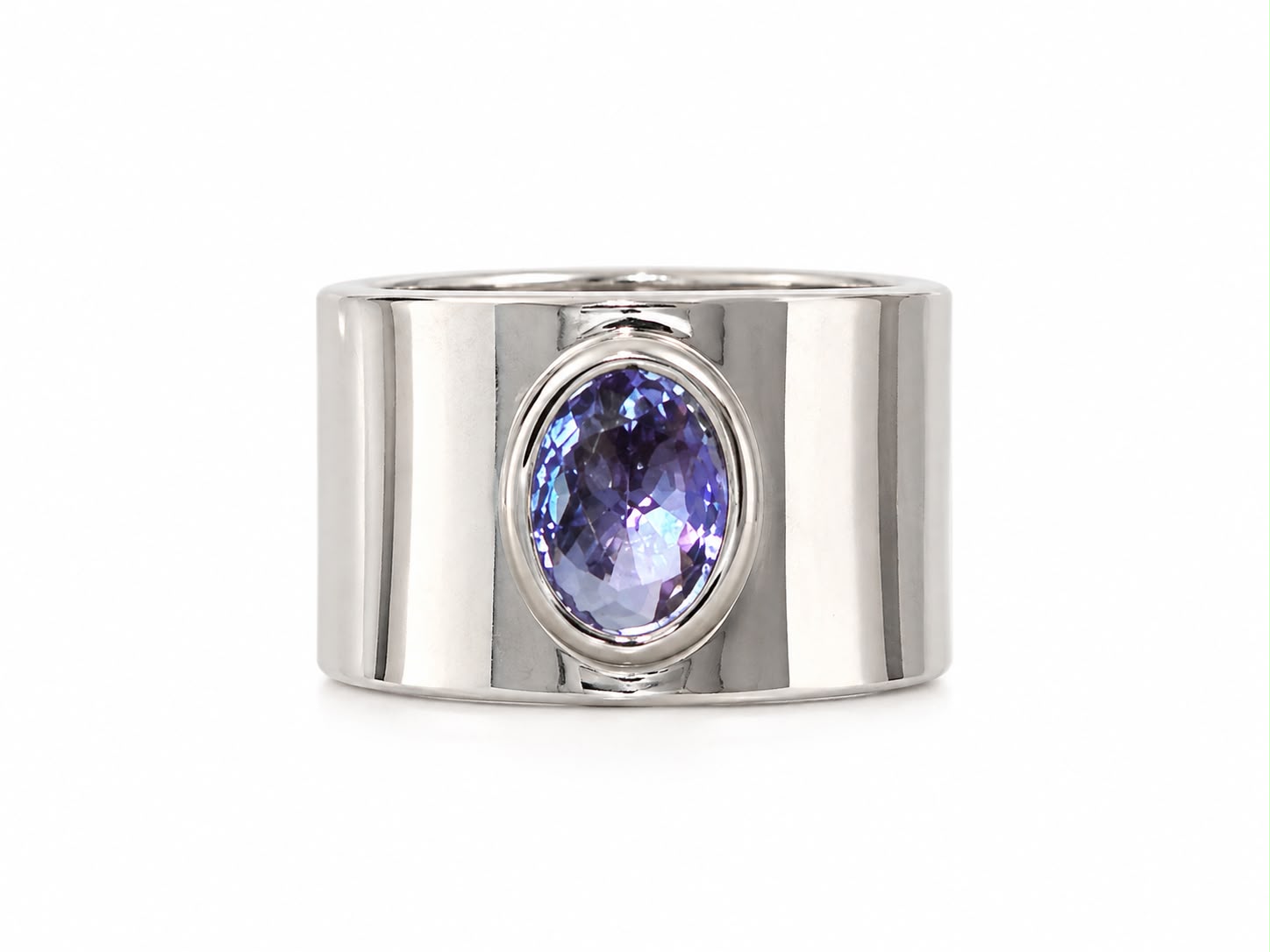 Anel com Kristal Oval Roxos Banhado a Ródio Branco